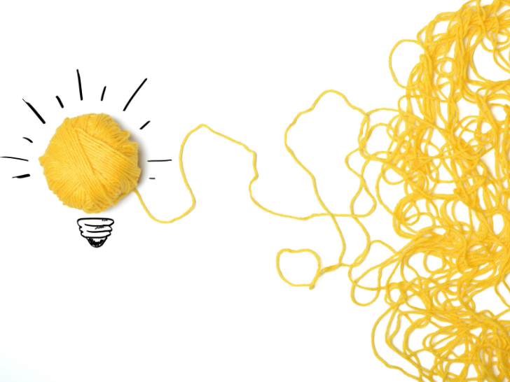 Yellow yarn creates a lightbulb
